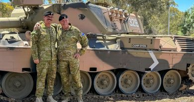 Warrant Officer Class Two William Parsons, right, with his son Warrant Officer Class Two Robert Parsons, outside the Royal Australian Armoured Corps Sergeants' Mess at the Puckapunyal Military Area. Story by Corporal Luke Bellman.