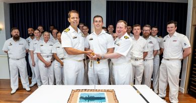 Captain Richard Brickacek, front left, Midshipman Rhys Williams and Commanding Officer ADV Cape Pillar Lieutenant Commander Liam McMahon cut a homeporting cake at Larrakeyah Officers' Mess, Darwin. Photos by Leading Seaman Ernesto Sanchez.