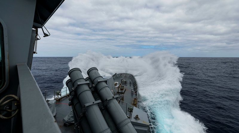 HMAS Warramunga underway in rough sea state during a regional presence deployment. Story by Lieutenant Commander Andrew Herring. Photos by Petty Officer Leo Baumgartner.