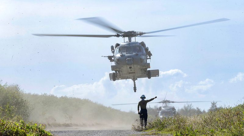 A US Navy MH-60S Seahawk takes flight at Tinian North during Exercise Cope North 24. Photo by Leading Aircraftwoman Maddison Scott.