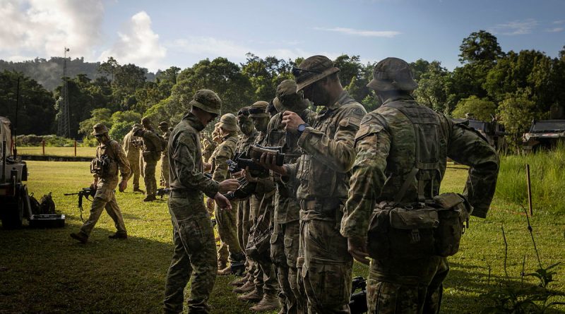 Australian Army soldiers from 1st Battalion, the Royal Australian Regiment, conduct a clearance before a live-fire activity at Tully training area in Queensland. Story by Captain Brittany Evans. Photos by Trooper Dana Millington.