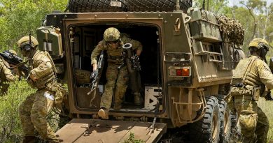 Trooper Lachlan Hinspeter, of 2nd Cavalry Regiment, dismounts from an Australian light armoured vehicle at Townsville Field Training Area, Queensland. Story and photo by Captain Brittany Evans.