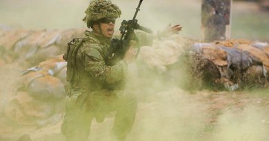 Lance Corporal Winston Li of 10th/27th Battalion, the Royal South Australian Regiment, yells instructions during training at the Murray Bridge Training Area, South Australia. Story by Captain Peter March. Photos by Sergeant Peng Zhang.