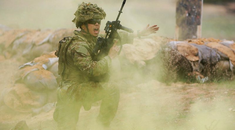 Lance Corporal Winston Li of 10th/27th Battalion, the Royal South Australian Regiment, yells instructions during training at the Murray Bridge Training Area, South Australia. Story by Captain Peter March. Photos by Sergeant Peng Zhang.