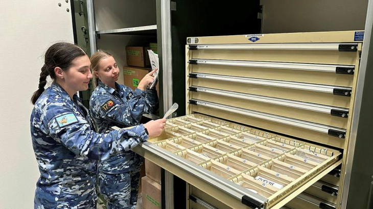 Leading Aircraftwoman Indianna Biles and Leading Aircraftwoman Olivia Jacobs conduct a stocktake prior to sealing the container holding the spares pack, ready for transportation to RAAF Base Tindal, Northern Territory.