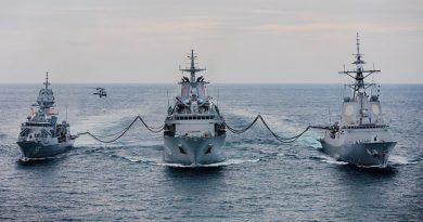 HMAS Stalwart conducts a dual replenishment at sea with HMA Ships Toowoomba and Brisbane during an Asian regional presence deployment. Photo by Leading Seaman Daniel Goodman.