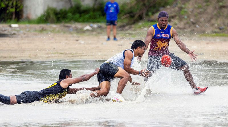 Local participants take part in a practice match during an ADF Australian rules coaching course at Linkbelt Oval, Yangor, Nauru. Story by Squadron Leader Amanda Scott. Photos by Leading Seaman Matthew Lyall.