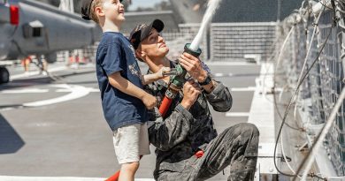 Able Seaman Peter Mason demonstrates fire-fighting hose techniques onboard HMAS Arunta during Fleet Base East's open day, Sydney. Story by Lieutenant Marie Davies. Photos by Able Seaman Lucinda Allanson.