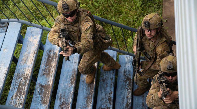 Soldiers from 3rd Battalion, The Royal Australian Regiment during an urban operations exercise at the disused Stuart State School in Townsville. Story and photo by Corporal Luke Bellman.