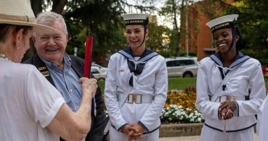 Able Seaman Georgia Bonnett, second from right, and Seaman Vimbayi Hakutangwi, right, talk with veterans in Bathurst during HMAS Harman's Navy Week tour of the central west. Story and photos by Corporal Jacob Joseph.