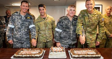 From left, Commanding Officer HMAS Stuart Commander Richard Raymond, Sapper Sean Egan-Richards, Seaman Thomas Brum and Australian Defence Adviser to Fiji Army Colonel Henry Stimson cut the 123rd birthday for cakes for Navy and Army on board HMAS Stuart while at anchor in Suva, Fiji. Story by Lieutenant Commander Andrew Herring. Photos by Leading Seaman Rikki-Lea Phillips.