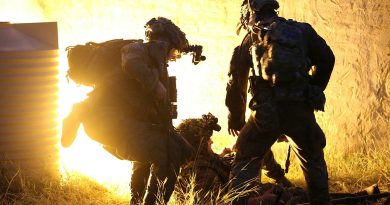 A 3rd Combat Engineer Regiment soldier assists a simulated casualty during an urban breaching exercise at Townsville Field Training Area. Story and photo by Corporal Luke Bellman.