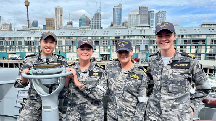 Able Seaman Kendall Byrnes, left, Commander Tina Brown, Lieutenant Tori Costello and Sub-Lieutenant Cameron Moncrieff on board HMAS Hobart. Story by Sub-Lieutenant Madelyn Hanna.