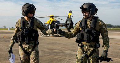 Army helicopter pilot Lieutenant Nicole Ravell and aircrew operator Corporal Corren James, of 723 Squadron, on the flight line at HMAS Albatross. Story by Captain Karam Louli. Photos by Leading Aircraftwoman Emma Schwenke.