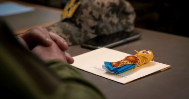 A traditional ceremonial guardian doll and handwritten letter from the Ukrainian community in Australia sits on the desk of a Ukrainian soldier attending an Australian Army-led leadership course in England. Story by Lieutenant Carolyn Martin. Photos by Corporal Nicole Dorrett.