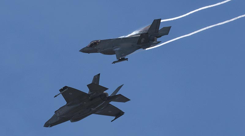 F-35A Lightning II aircraft A35-020 breaks away from A35-038 in readiness to land at RAAF Base Williamtown during Exercise Diamond Shield 24. Photo by Leading Aircraftman Kurt Lewis.