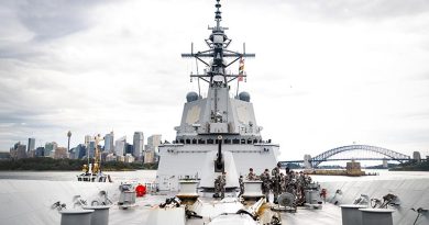 Members of HMAS Hobart’s forecastle party handle lines as the ship departs Fleet Base East, Sydney, before the commencement of their Indo-Pacific Regional Presence deployment. Photo by Leading Seaman Matthew Lyall.