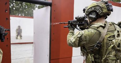 Australian Army soldiers form the 6th Battalion, Royal Australian Regiment conduct urban live-fire training at Greenbank Training Area. Photo by Corporal Dustin Anderson.