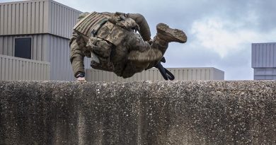 Armed Forces of Ukraine personnel conduct an urban assault, as part of the Platoon and Company Sergeants Battle Course run by Australian Army soldiers deployed on Operation Kudu in the United Kingdom, March 2024. Image has been digitally altered for security purposes.