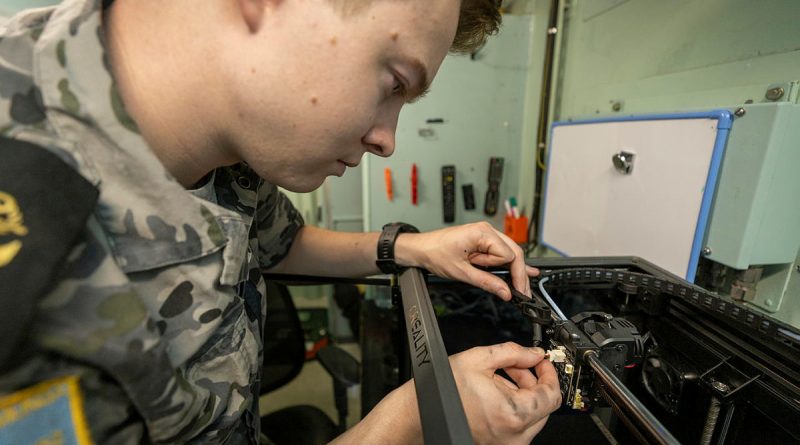 Leading Seaman Nicholas Parks said the 3D printer was a welcome addition to HMAS Warramunga. Photo by Petty Officer Leo Baumgartner.