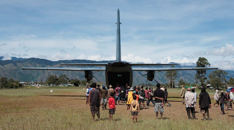 A RAAF C-27J Spartan from 35 Squadron parked at Telefomin Airport, Papua New Guinea, during the Defence Pacific Air Program. Story by Flight Lieutenant Claire Campbell. Photos by Corporal Samuel Miller.