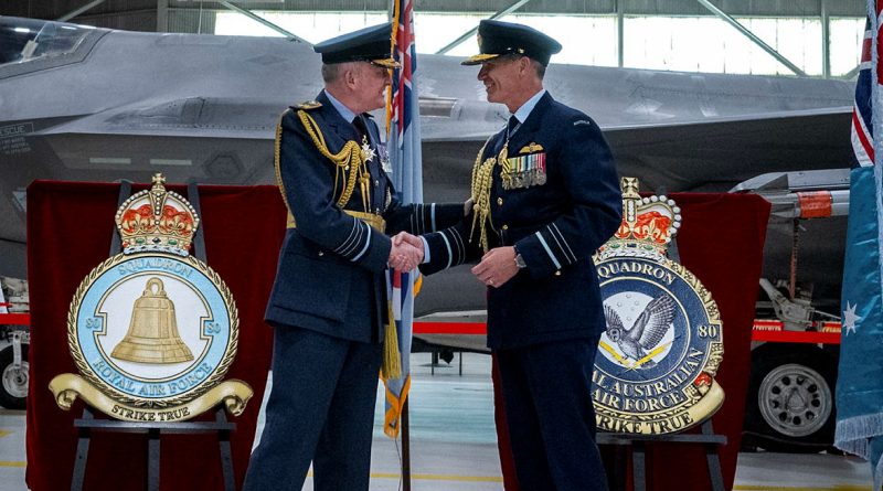 Royal Air Force Chief of the Air Staff Air Chief Marshal Sir Rich Knighton (L) and Royal Australian Chief of Air Force Air Marshal Robert Chipman shake hands at the 80 Squadron re-formation ceremony at Eglin Air Force Base, Florida. Story by Flight Lieutenant Rachael Blake. Photos by USAF Samuel King Jr.