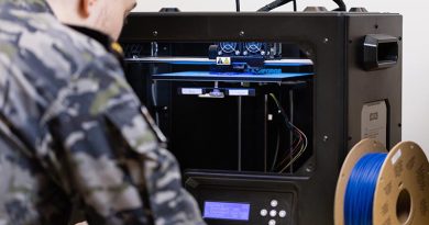 Royal Australian Navy sailor Able Seaman Dillan Ackerman oversees 3D printed engineering parts at Fleet Support Unit – South East, Sydney. Photo by Leading Seaman Jarrod Mulvihill.