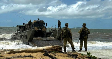 Army soldiers from 10th Force Support Battalion conduct a beach landing of an HX-40M during Exercise Green Anchor. Story by Captain Joanne Leca.