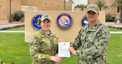 Leading Seaman Maritime Personnel Operator Tahlia Lemon recieves a letter of commendation from Commander of the Combined Maritime Forces and Commander US 5th Fleet, US Navy Vice Admiral George Wikoff while deployed on Operation Manitou. Story by Lieutenant Ben Page.