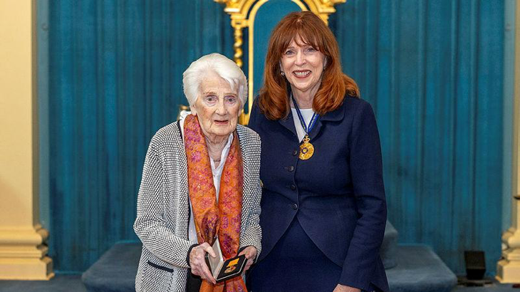 Victorian Governor Margaret Elaine Gardner, right, presents the daughter of Pilot Officer David Taylor, Margaret Ekberg, with his Medal for Gallantry for heroism in PNG during WW2. Story by John Noble.