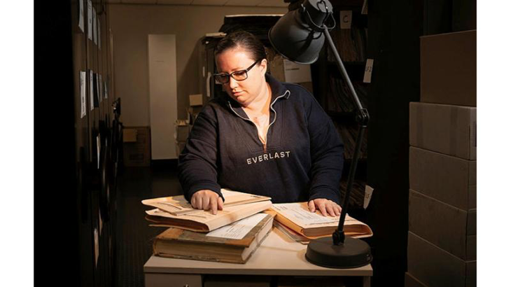 Nikki Dohnt, of the Military Police Central Records Office, sorts through archives in Canberra.