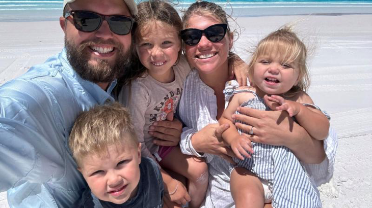 Chief Petty Officer Joshua Scanlon, with his fiancé Kate Barry and their three children, Jonty, Leila and Tillie, enjoying a family holiday. Story by Lieutenant Marie Davies.