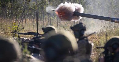 Gunners from the 1st Regiment, Royal Australian Artillery, fire an M777 Howitzer while taking up defensive firing positions, at Shoalwater Bay Training Area. Photo by Private Alfred Stauder.