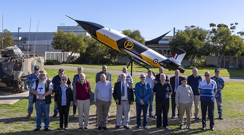 Members of the South Australian branch of the Air Force Association stop in front of a Jindivik target drone at the officers' mess, during a visit to RAAF Base Edinburgh, South Australia. Photo by Leading Aircraftwoman Annika Smit.
