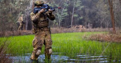An Australian Army soldier at the School of Infantry conducts an obstacle crossing during a patrol at the Singleton Military Area, NSW. Photo by Corporal Johnny Huang.