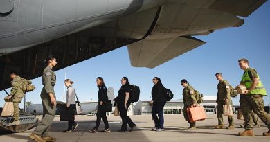 Stranded tourists board a RAAF C-130J Hercules at Noumea’s Magenta Airport for repatriation to Australia following violent unrest in New Caledonia. Photo by Leading Aircraftman Adam Abela.