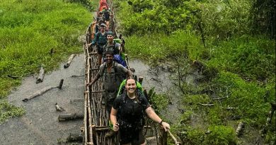 HMAS Cairns sailors cross a swamp marsh on their way to Agulogo on day three along the Kokoda Track. Story by Corporal Melina Young.