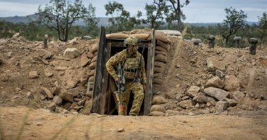 An Army soldier exits the underground command post bunker during Exercise Brolga Run at Townsville Field Training Area, Queensland. Story by Captain Brittany Evans. Photos by Trooper Dana Millington.
