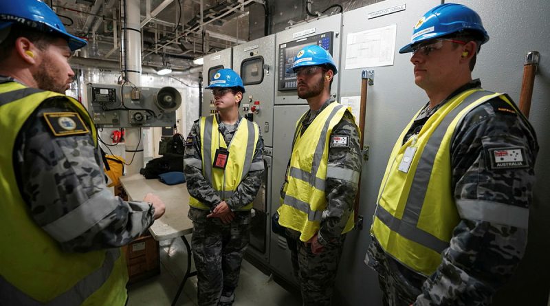 Apprentice technicians from the Technical Training Faculty are given a tour of technical infrastructure aboard HMAS Canberra as part of the new Navy apprentice technician experience tour. Photos by Peter Loncar.