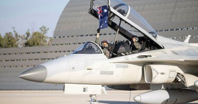 A Philippine Air Force FA-50PH pilot holds an Australian flag after arriving at RAAF Base Darwin, ready for Exercise Pitch Black 24. Story by Flight Lieutenant Imogen Lunny. Photos by Leading Aircraftwoman Maddison Scott.