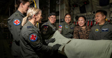 Health Operational Conversion Unit Aeromedical Evacuation course director, Flight Lieutenant Diane Casey, left, speaks with participating international partners inside a C-130J Hercules training fuselage at RAAF Base Richmond. Story by Flying Officer Madeleine Magee. Photo by Leading Aircraftman Chris Tsakisiris.