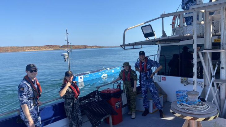 Sergeant Hannah Freeman and Flying Officer Jack Tucker, right, join other aviators on a Navy-led innovation voyage on commercial vessel MV Offshore Solution.