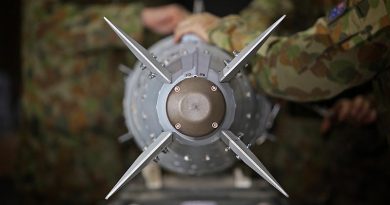 RAAF armament technicians prepare a guided bomb unit (GBU-32) for use by the Air Task Group in the Middle East region. Photo by Corporal Ben Dempster.