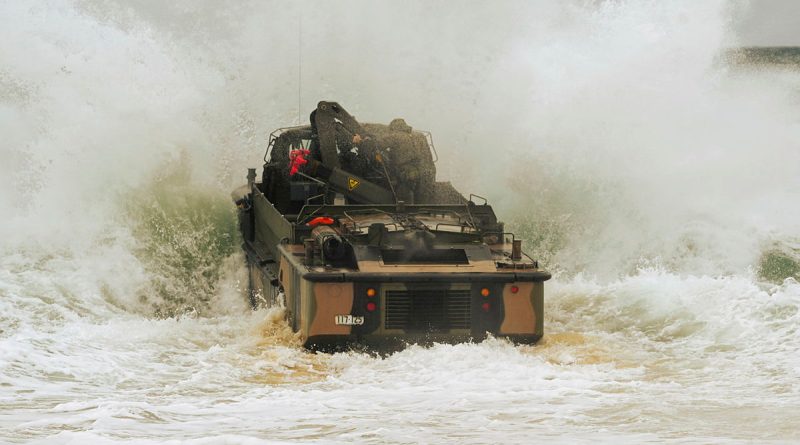 A LARC-V launches into the surf as part of littoral training at Rainbow Beach, Queensland. Story and photos by Captain Joanne Leca.