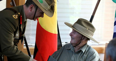 Commander 9th Brigade Brigadier Tim Orders presents World War 2 veteran, Glen Dobie, with his Australian Service Medal 1945-75 with Clasp 'PNG'. Story and photos by Captain Peter March.