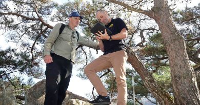 Adam Bourke, left, and Major Dan Nailer fix their position during a reconnaissance of the Kapyong battlefield in the Republic of Korea. Story and photos by Lieutenant Commander Brendan Trembath.