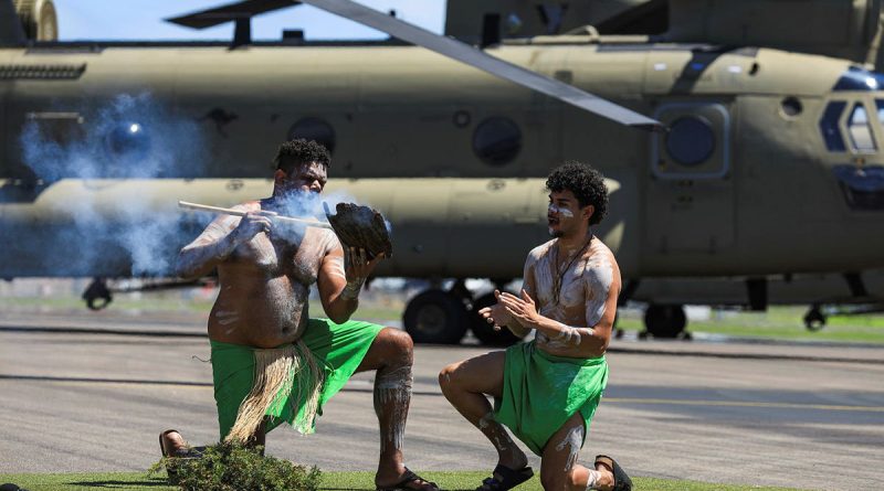 The Wulgurukaba people perform a smoking ceremony at the 5th Aviation Regiment naming ceremony of four CH-47F Chinook helicopters at RAAF Base Townsville, Queensland. Story by Major Carolyn Barnett. Photos by Craftsman Luc McLean.