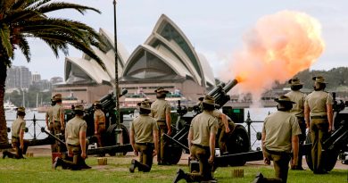 Army gunners from the 9th Regiment, Royal Australian Artillery, fire a 21-gun salute under the Sydney Harbour Bridge during Australia Day celebrations. Story by Lieutenant Marcus Middleton. Photo by Sergeant Tristan Kennedy.