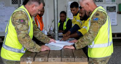 Australian Army soldiers WO2 Bryan Griff and WO2 Paul Thornhill gather with contractors from Reeves Envico and Hebou to discuss the progress of the PNGAus Partnerships’ Potable Water Infrastructure Works at the PNG Defence Force’s Goldie River Training Depot, PNG. Story by Major Evita Ryan. Photos by Corporal Joshua Thomas.