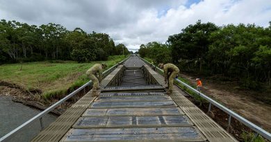Soldiers from 3rd Combat Engineer Regiment assemble a medium girder bridge at Ollera Creek, Townsville, during Defence Assistance to the Civil Community following severe weather and flooding across the region. Story by Captain Brittany Evans. Photos by Corporal Riley Blennerhassett.